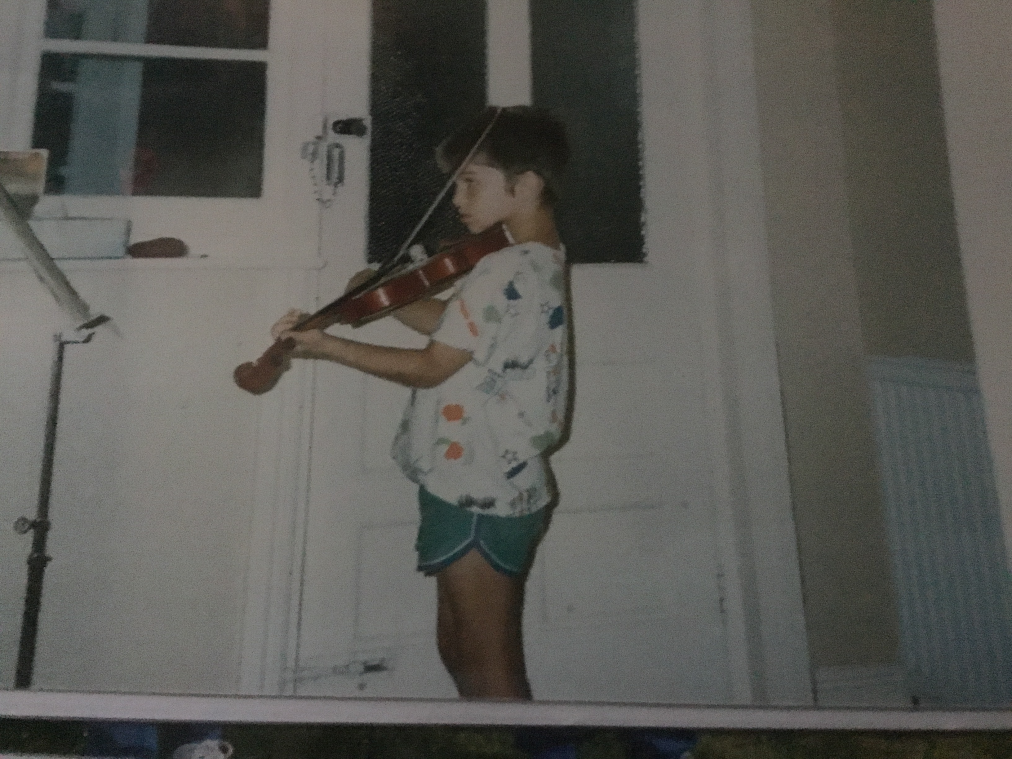 Playing fiddle as a child in 1988